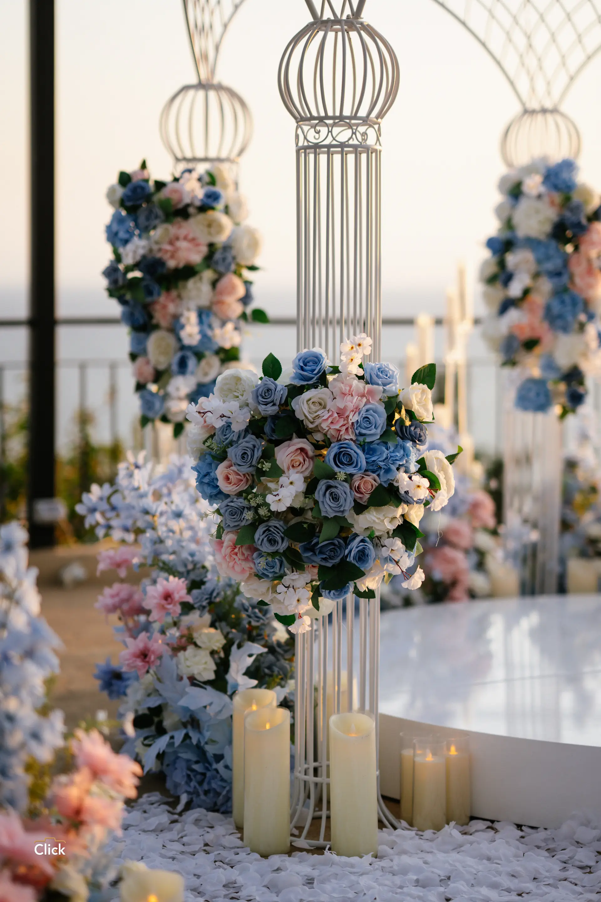 Camp Pink candlelit proposal portrait with ivory florals and sculpted lighting.